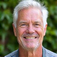 Confident portrait of Mike, who found relief from chronic back pain.